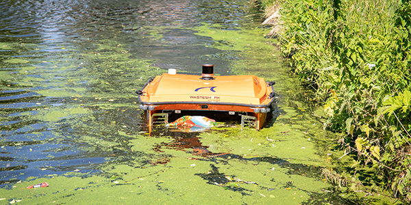 WasteShark by RanMarine collects plastic waste and algae from the water surface.