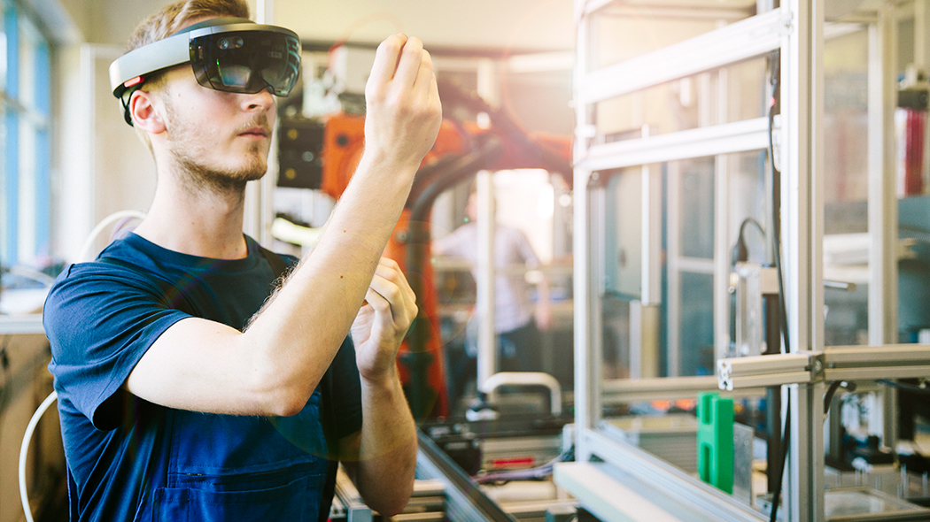 Production employer wearing AR glasses