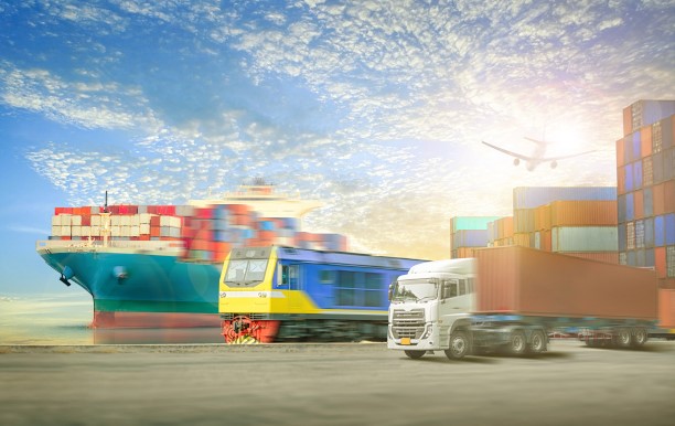 Container ship, rail and truck at a container port