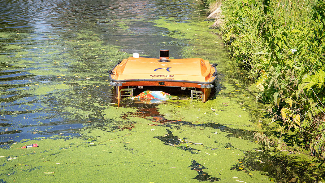 WasteShark by RanMarine collects plastic waste and algae from the water surface.