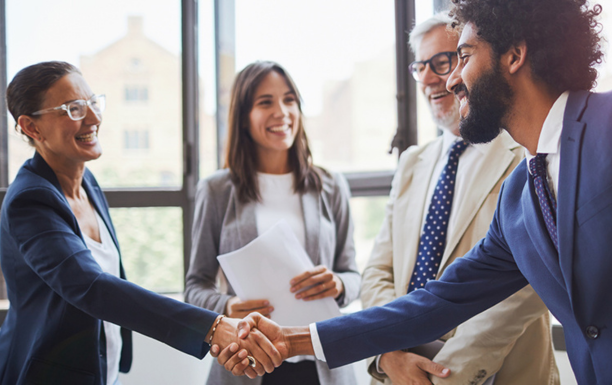 Man and woman shake hands