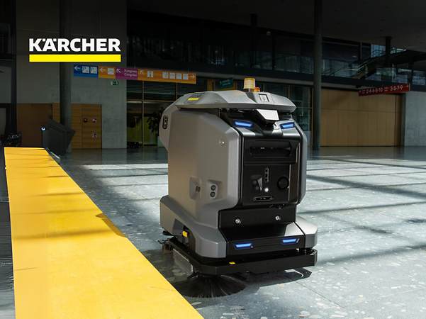Autonomous cleaning robots from Kärcher in a warehouse