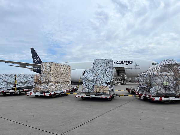 Air freight with airplane in the background