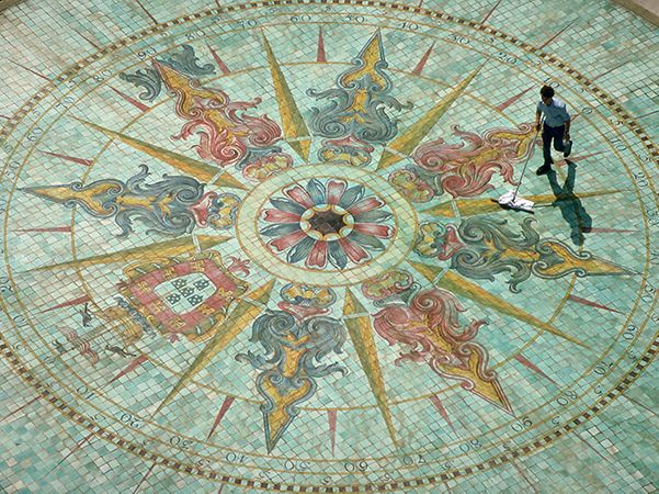 Representation of a compass rose made of tiles