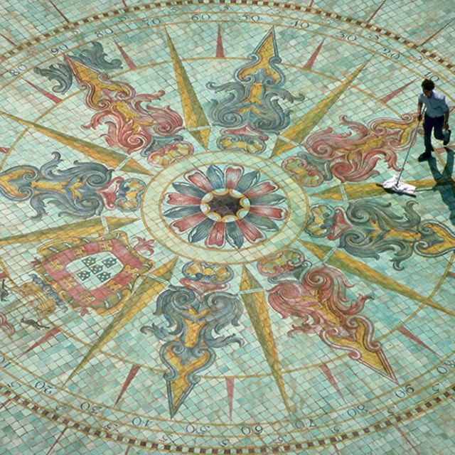 Representation of a compass rose made of tiles