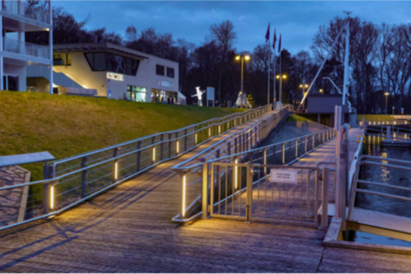Lights on the pier and along the jetties in the Priwall marina near Travemünde