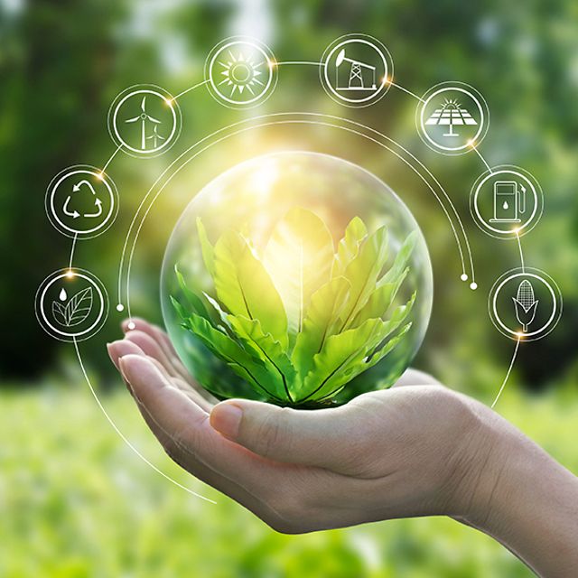 Stilisierte Fabrik aus grünen Blättern