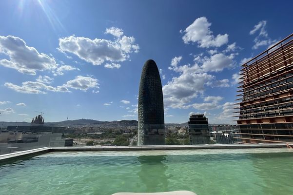 View of the Torre Glories in Barcelona from the hotel pool