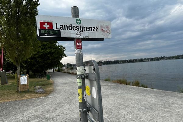 Border sign Germany - Switzerland on the shore of Lake Constance