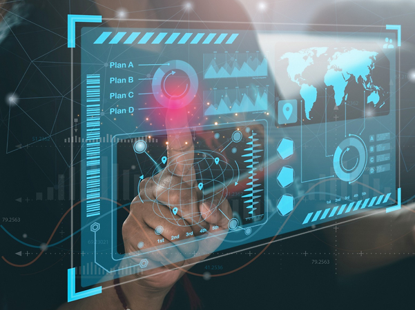 Hand operating a digital touchscreen dashboard with data visualization.