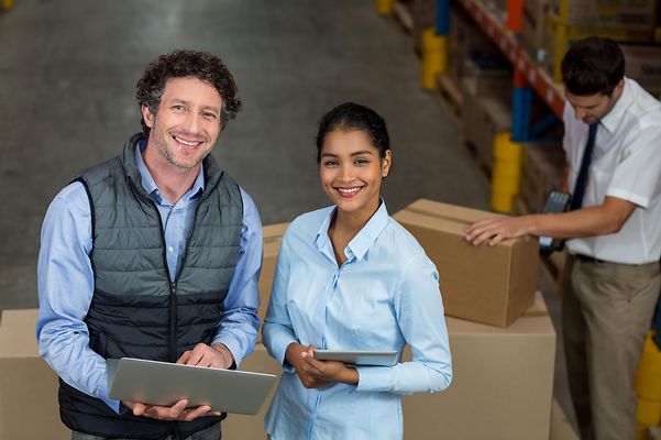 Employees smiling at the camera