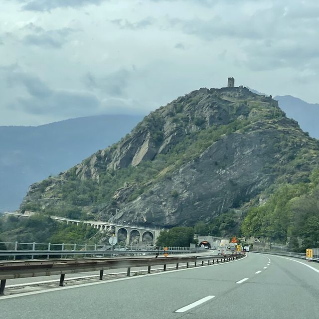 The motorway in the direction of Mont Blanc leads into a tunnel under a
