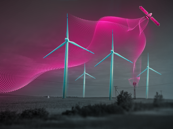 Wind turbines with abstract veil representing a net, in magenta colors.